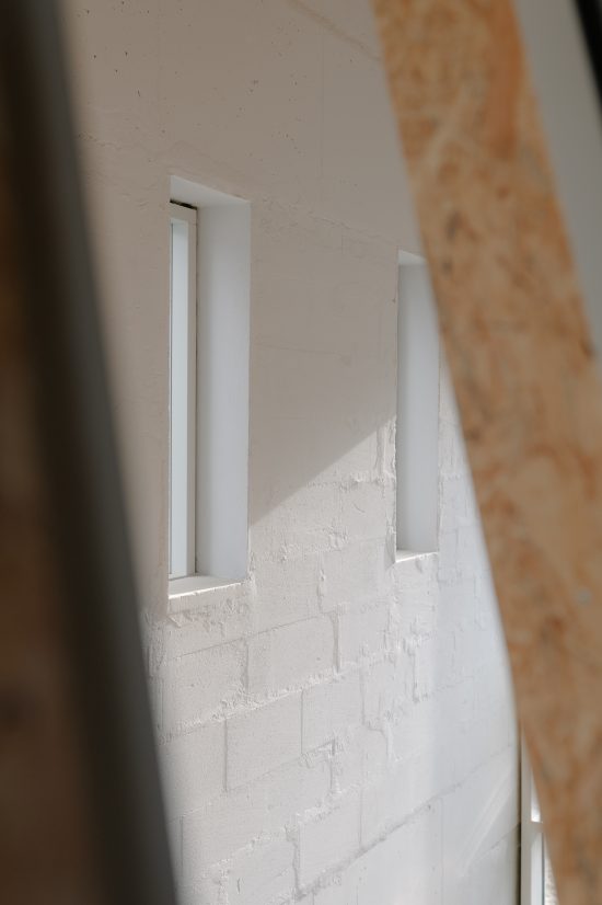 NSPH_Sigurd Larsen Design Architecture Germany stone wood urban house KKROM_Michael_Romstöck_Openings 2